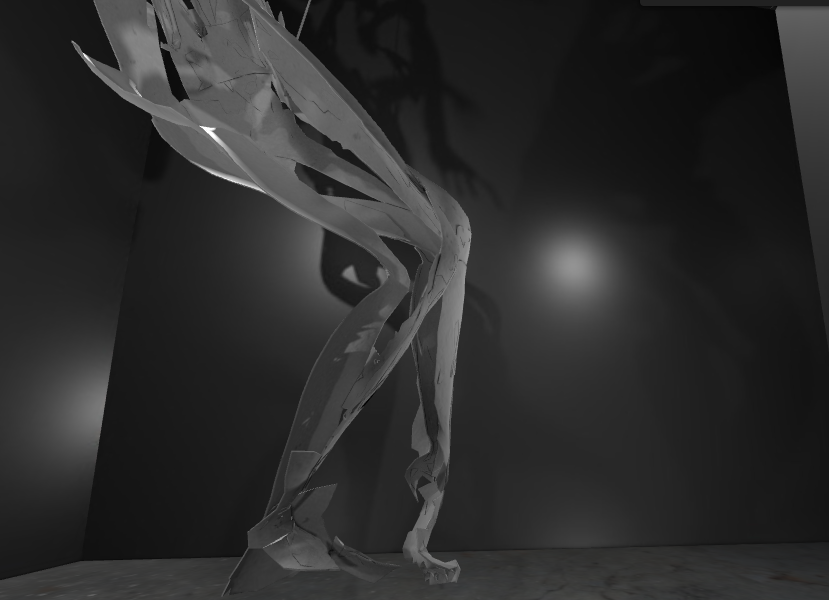 An image of a digital environment awash showing one of the human-like avatars in medium-close-up, focusing on the figure’s legs and feet. A spotlight is in the background and shadows of the figure are visible.