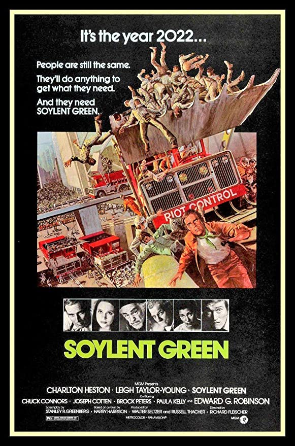 The film poster for Soylent Green is a painting that shows the protagonist, a Caucasian man in a beige coat, running from a Riot Control truck. The truck has a huge scoop attached to the front, which is full of protesters.